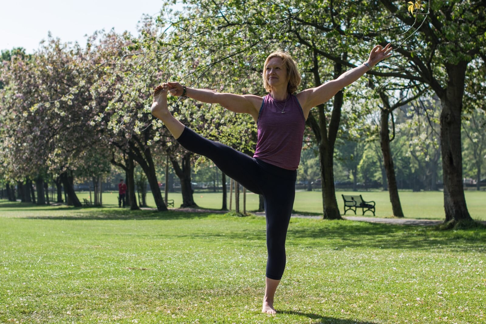 Sharon demonstrating a yoga movement